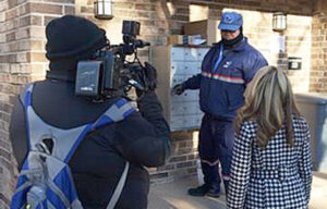 Tulsa, OK, Letter Carrier Dean Pingry was interviewed by a TV news crew during the recent cold front. Photo: KOKI-FOX