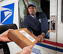 Mail Carrier delivering package