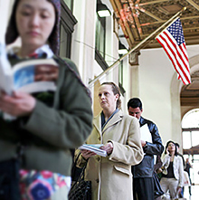 Customers stand in line at a Post Office on April 15, 2008. Photo: The New York Times