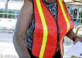 Miami P&DC Mail Handler Althea Atkins affixes an April 15 postmark to letters addressed to the Internal Revenue Service