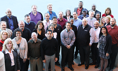 Employees who recently completed the Management Essentials course.