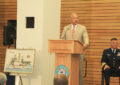 Homeland Security Secretary Jeh Johnson speaks as Adm. Paul Zukunft listens during the dedication ceremony.