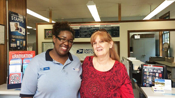 Hiram, OH, Retail Associate Starleen Schwan and customer Anne Collin