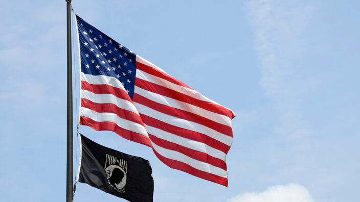 The U.S. Flag and the POW-MIA flag.