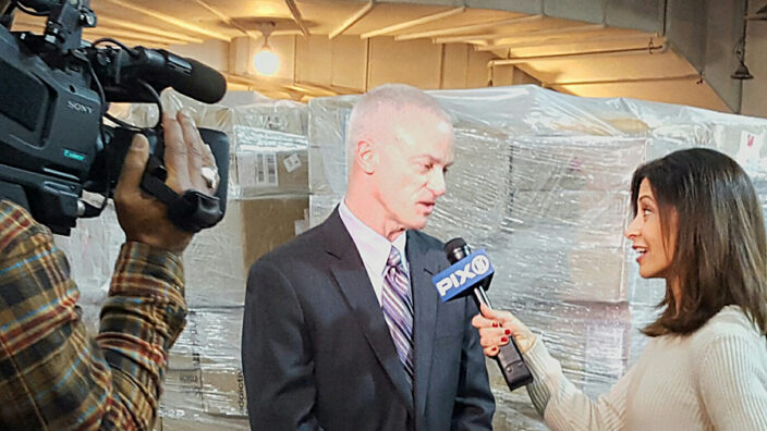 Consumer Advocate John Budzysnki is interviewed by WPIX-TV reporter Lisa Mateo in New York City Dec. 21.