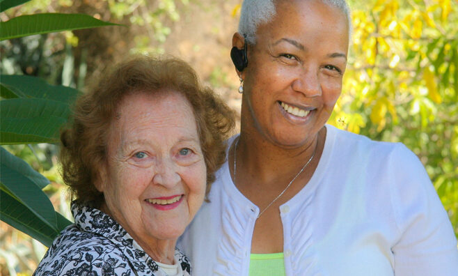 Los Angeles Manager Customer Services Thelma Johnson with customer Clara Taylor