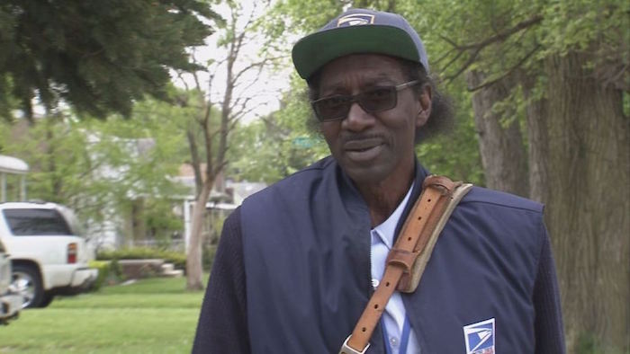 Detroit Letter Carrier Marlon Williams rushed to the aid of a family following a dog attack. Image: WJBK-TV