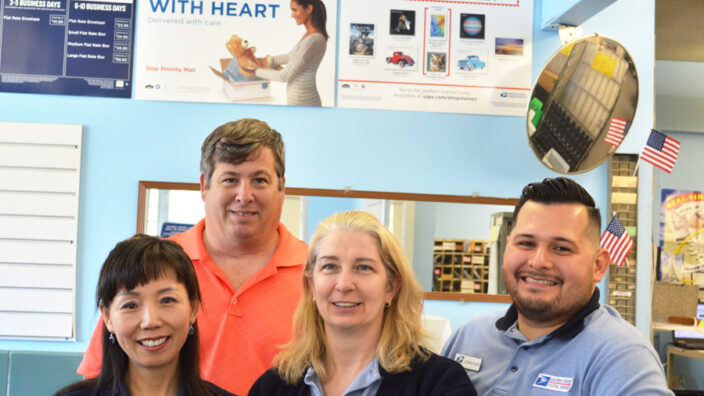 The Tobyhanna, PA, Post Office regularly ranks highly in retail performance. Postmaster Robert Grasso stands behind, from left, retail associates Sonha Mayatte, Patricia Lombardi and Jonathan Figueroa.