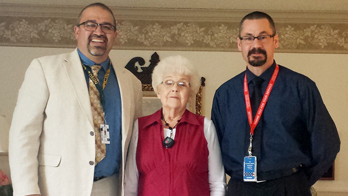 Dakotas District Sr. Plant Manager Marty Chavez and District Manager Doug Stephens pose with Marilyn Rice after delivering the letter.