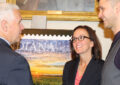 Indiana Gov. Mike Pence speaks to Great Lakes Area VP Jaqueline Krage Strako and photographer Michael Matti at the stamp dedication.