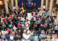 Participants gather for the dedication inside the Indiana State House in Indianapolis.