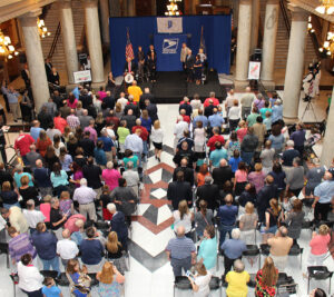 Participants gather for the dedication inside the Indiana State House in Indianapolis.