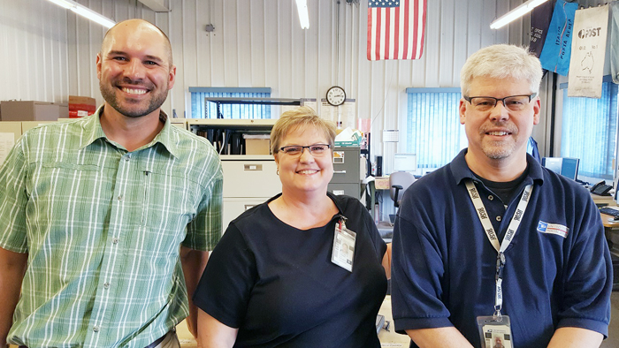 Kris Robak, a network specialist, and bulk mail technicians Cynthia Turner and Gary Granning made a positive impression on a customer recently.