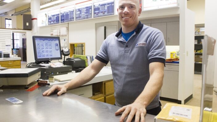 Albert Lea, MN, Retail Associate Tony Strangeland joined USPS four years ago. Image: Albert Lea Tribune