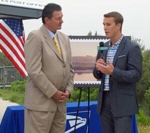 Chief Marketing and Sales Officer Jim Cochrane is interviewed at the Assateague Island National Seashore stamp dedication in Berlin, MD.