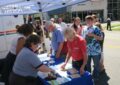 Customers line up to get special cancellation postmarks.