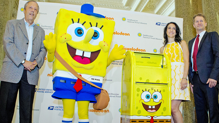 The induction ceremony featured, from left, Allen Kane, director of the National Postal Museum; SpongeBob SquarePants; Sharon Cohen, an executive vice president for Nickelodeon; and Chris Karpenko, the Postal Service’s brand marketing executive director.