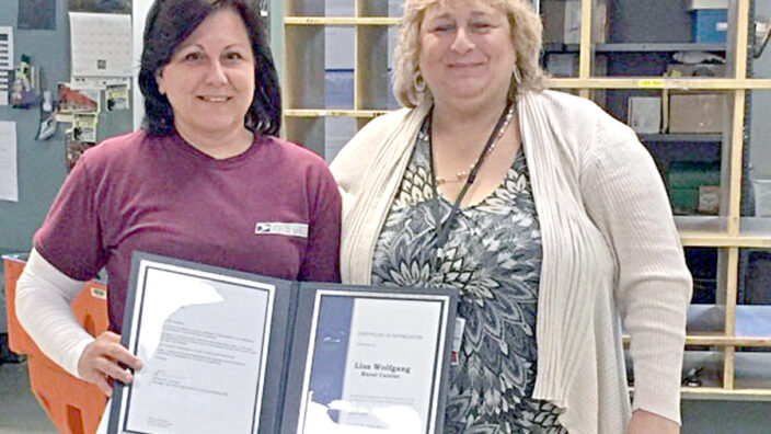 Hegins, PA, Rural Carrier Lisa Wolfgang and Post Office Operations Manager Andrea Caraciolo