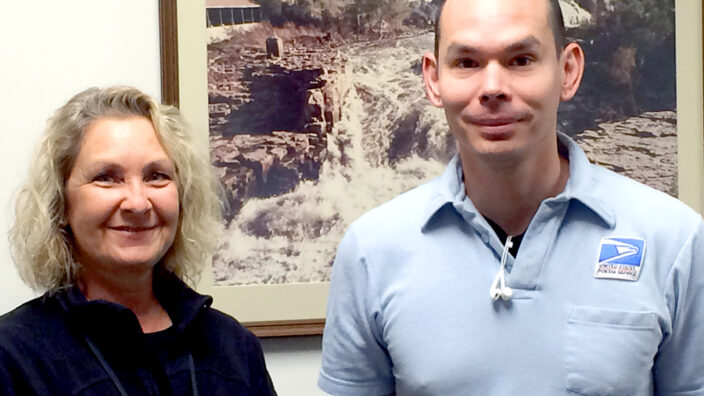 Sioux Falls, SD, Customer Services Manager Debra Brost and Letter Carrier Tommy Heuer