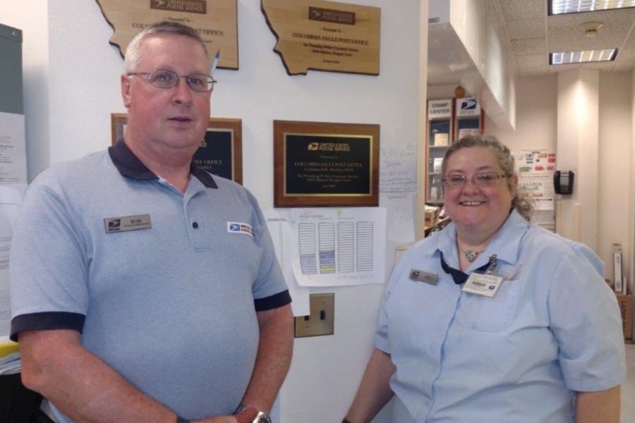 The Columbia Falls, MT, Post Office was a recent weekly winner in the PO Box contest. Employees who received recognition include, from left, retail associates Robert Childers and Kay Koppenhaver.
