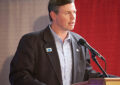 Chief Human Resources Officer Jeffrey Williamson addresses the audience at the July 15 stamp dedication ceremony.