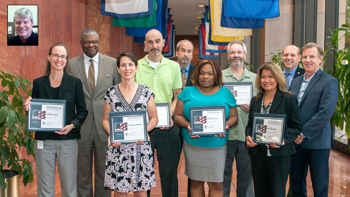 Postal Service leaders gather with the latest recipients of the Chief FOIA Officer Awards. From left: Jennifer Lynch, DPMG Ron Stroman, Junemarie Brandt, Anthony Alverno, General Counsel Tom Marshall, Sheila Dawson, Stephen Kochersperger, Annette Raney, Chief FOIA Officer Mike Elston and Chief Financial Officer Joe Corbett. Tony Joy is shown in the inset photo.