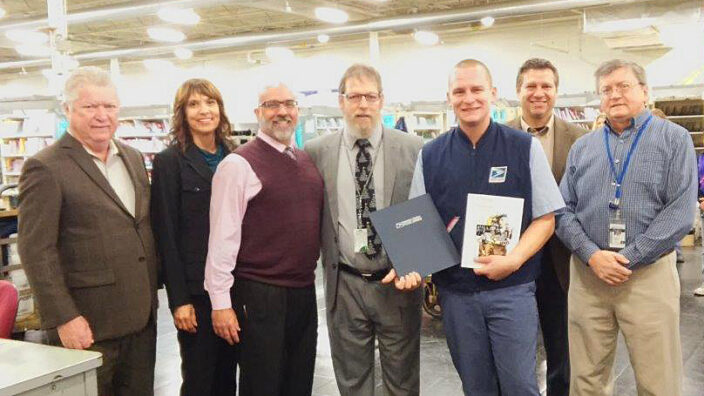 From left, National Association of Letter Carriers Business Agent Bill Lucini; Senior Post Office Operations Manager Mary Tyneway; West York, PA, Officer in Charge Jose Canto; District Manager James Drummer; York City Carrier Assistant Lars Edleblute; York Postmaster Mike Becker; and NALC Branch 509 President Steve Hanna at a Central Pennsylvania District recognition event for Edleblute.