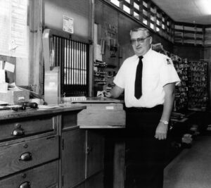 Donald Holmquist, the Hisndale, NH, Post Office’s officer in charge, circa 1981