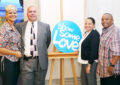 Triboro District employees who showed some love at this year’s CFC kickoff include, from left, Retail Specialist Julie Medina, Human Resources Manager Dave Rudy, Consumer and Industry Contact Analyst Evelyn Surillo and Brooklyn P&DC General Expeditor Michael Perry.