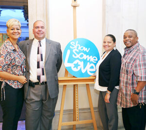 Triboro District employees who showed some love at this year’s CFC kickoff include, from left, Retail Specialist Julie Medina, Human Resources Manager Dave Rudy, Consumer and Industry Contact Analyst Evelyn Surillo and Brooklyn P&DC General Expeditor Michael Perry.