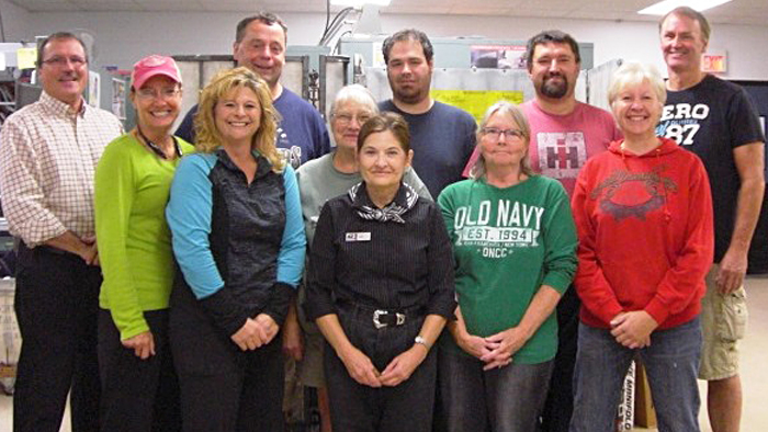 Pictured from the left to right (back row) are: Postmaster Jim Forer, Rural Carrier Associate (RCA) Scott Sisko, Clerk Matt Teal, RCA Bill Byrd, Rural Carrier Andy Berens, (front row) Rural Carrier Sandee Baumann, Rural Carrier Vonda Kaiser, Rural Carrier Shirley Liss, Clerk Jean Walters, RCA Donna Weisenberger and Rural Carrier Marianne Literski. Not pictured: RCA Jamie Bruner, RCA Jenni Kearns, Rural Carrier Christele Hall, RCA Katie Haydon, Clerk Justin Hawthorne, Clerk Dave LaFave and Rural Carrier Julie Seubert.