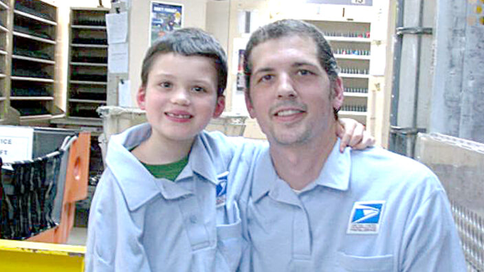 Maple Valley, WA, Retail Associate Jason Queirolo with his son, Gavin