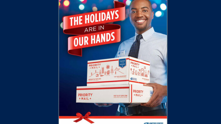 A point-of-purchase poster features St. Louis Retail Associate Sahaar Webb, one of the employees featured in this year’s holiday retail campaign.