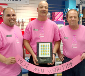 Northampton, MA, retail associates Isidoro “Izzy” Santiago, Daniel Manjourea and Charles Klepacki show their support for Breast Cancer Awareness Month.
