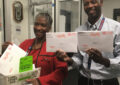 In Charlotte, NC, distribution operations managers Crystal Hutchins-Jones and Jeff McClure accept the last batch of this year’s absentee ballots before the state deadline.