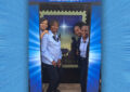 Washington, DC, retail associates Deborah Valentine, Angelia Estes- Flowers, Tammy Sowell-Littlejohn and LaDonna Cooke are photographed near a Nativity stamp display.