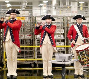 The Air Force Fife and Drum Corp perform the national anthem at the Merrifield, VA, Processing and Distribution Center.