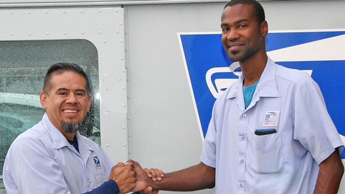 South Gate City, CA, Letter Carrier Ramon Perez received help from City Carrier Assistant Brian Williams during a dangerous situation.