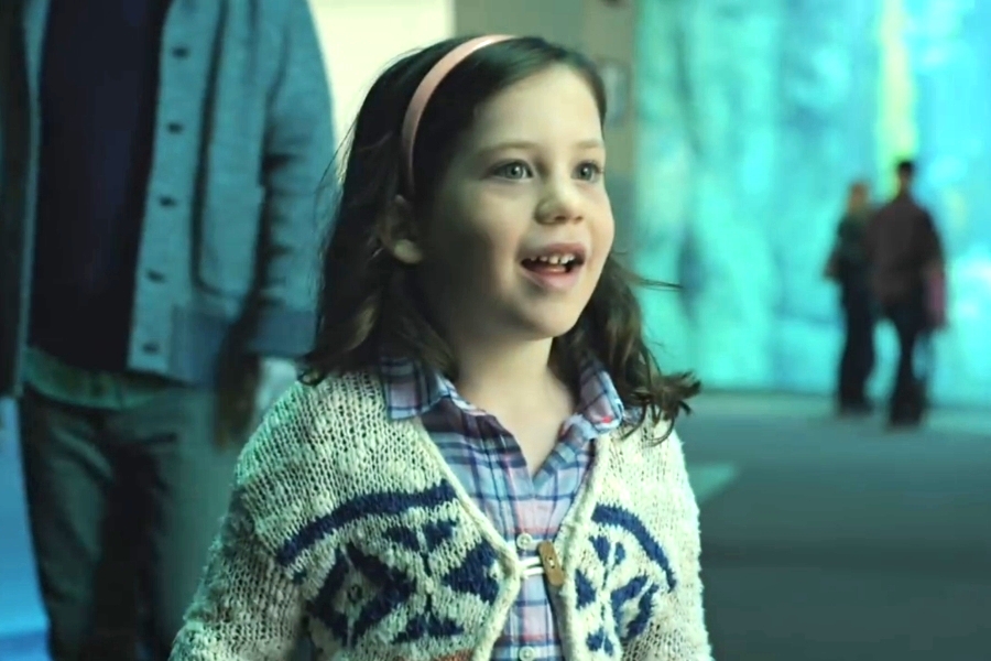 The commercial features a little girl who wishes for a hippo for the holidays — and gets it, courtesy of her parents and USPS.