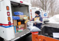 North Tonawanda, NY, Letter Carrier Emily Skuce loads her LLV before beginning her deliveries Dec. 22.