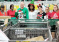 The holiday team at the Ybor City, FL, Processing and Distribution Center includes, from left, Postal Support Employee clerks Monica Ware and Samatha Hill, Distribution Operations Acting Manager Jeremy Wray, Distribution Operations Manager Kim Crompton, and mail processing clerks Kim Schaefer, Yvonne Delutri and Angela Sayre.