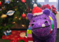 The Christmas tree in Chief Operating Officer David Williams’ office emphasizes the #PostalProud initiative and is accompanied by a purple hippopotamus, similar to the one featured in this year’s holiday TV campaign.