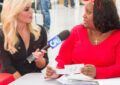 KTLA-TV reporter Courtney Friel interviews Clerk Judy Taylor about the Operation Santa program at the Los Angeles Processing and Distribution Center.