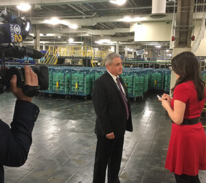 Triboro District Sr. Plant Manager Ricardo Quental is interviewed by WCBS-TV reporter Andrea Grymes at the Brooklyn, NY, Processing and Distribution Center.