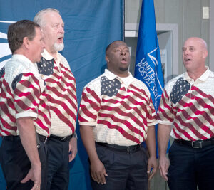 The Freedom Four Quartet musical group performs at the stamp dedication ceremony.