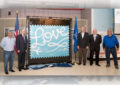 Present at the stamp unveiling are, from left, Stephen Stinis, president of Skytypers; Williams; Chris Clark, vice president and chief operating officer of Operation Gratitude, a group that sends care packages to armed forces personnel; Kevin Thompson, a Planes of Fame Air Museum aviation historian; and Greg Stinis.