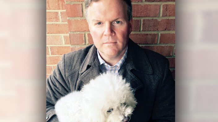 USPS Writer Jonathan Padget and his dog Daisy