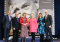 Stamp ceremony participants on stage