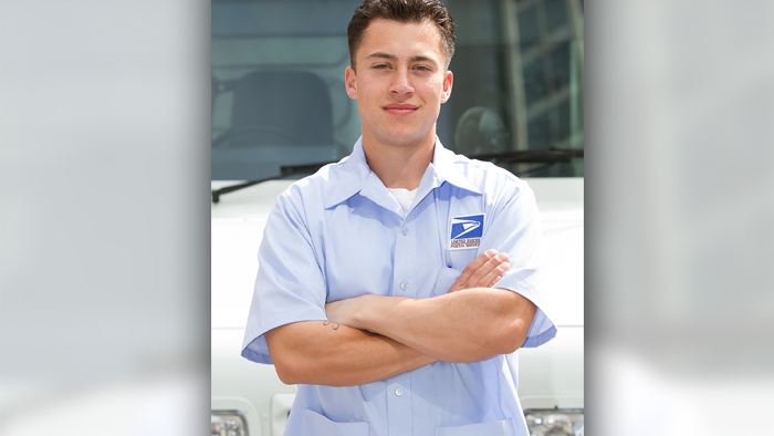 Male carrier poses in front of LRV