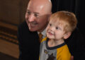 Nebraska Gov. Pete Ricketts and child